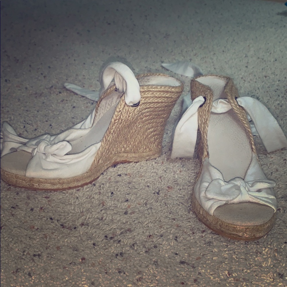 Strappy tie up leg wedge heels.